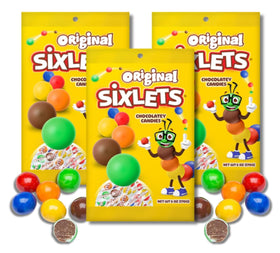 Shallow bowl with Sixlets colorful candies for festive vibes.
