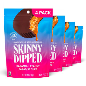Close-up of SKINNYDIPPED Caramel Peanut Paradise Cups with dark chocolate shell and caramel, low-sugar indulgence.