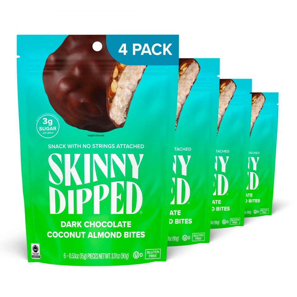 SkinnyDipped dark chocolate coconut almond bites in packaging, convenient on-the-go snack.