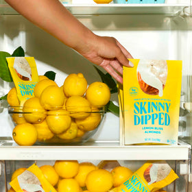 Lemon-kissed almonds with a light dusting of sweetness and zest detail.