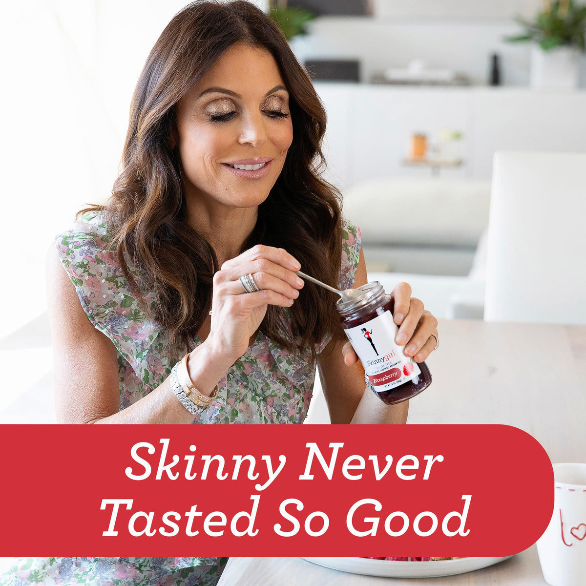 Toast topped with Skinnygirl Raspberry Bellini preserves showing vibrant berry spread