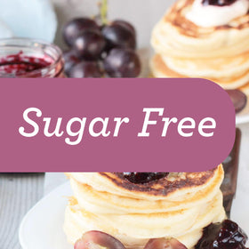 Skinnygirl Concord grape preserves on yogurt, adding a fruity touch.