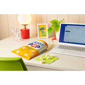 SkinnyPop whole-grain popcorn image highlights high fiber snack with simple, clean ingredients.