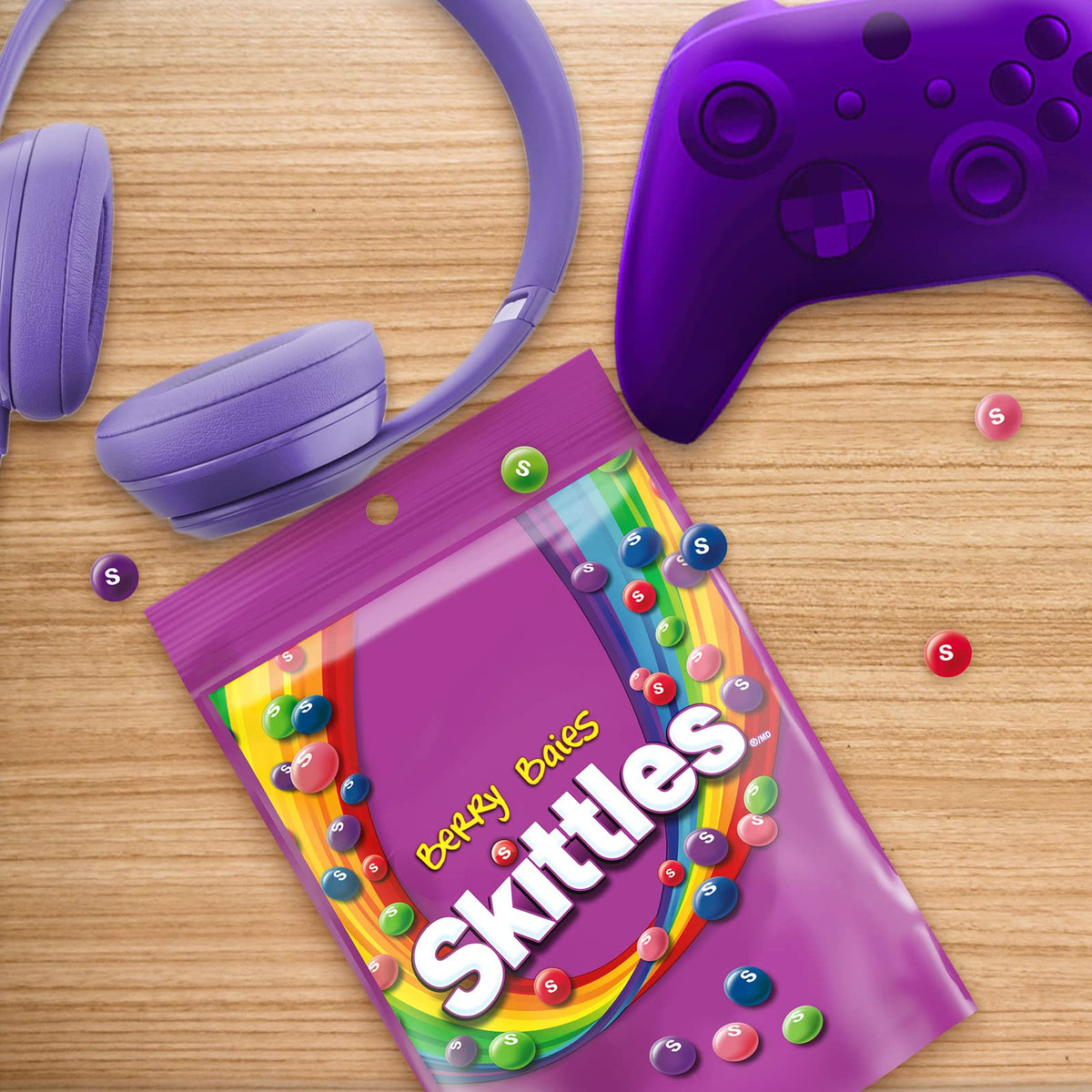 Skittles Berry packaging imported from Canada on store shelf.