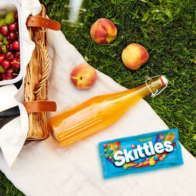 Skittles Tropical foil-wrapped packs ideal for sharing at events.