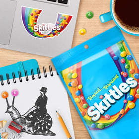 Skittles Tropical pack on store shelf highlighting gluten-free option