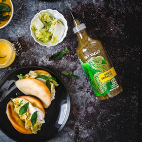 Sky Valley Green Sriracha in travel-friendly bottle on-the-go.