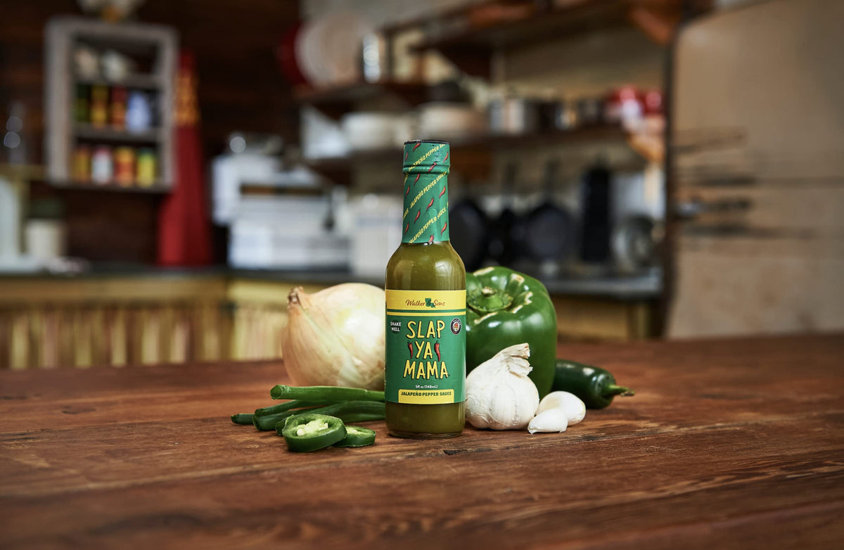 Slap Ya Mama Jalapeno Green label close-up reveals zesty notes.