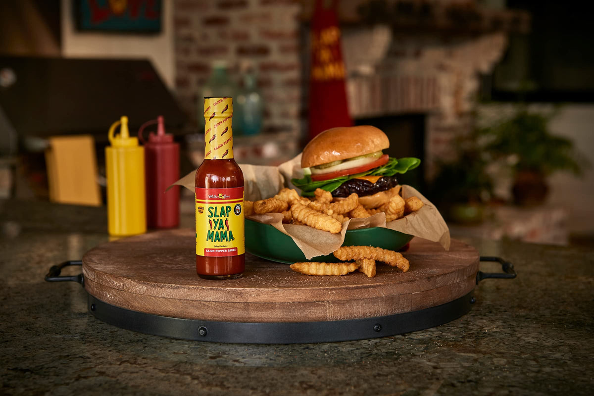 Slap Ya Mama Louisiana hot sauce two-pack display signals great value.