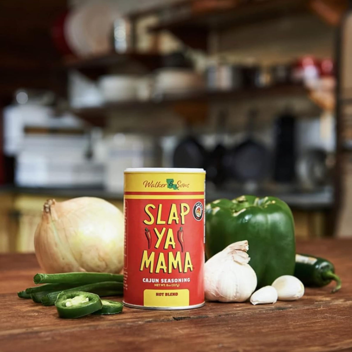 Slap Ya Mama seasoning sprinkled over grilled vegetables