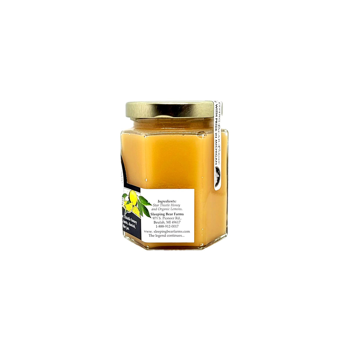 Sleeping Bear Farms Lemon Creme Honey jar pour - releases bright citrus aroma, great in tea.