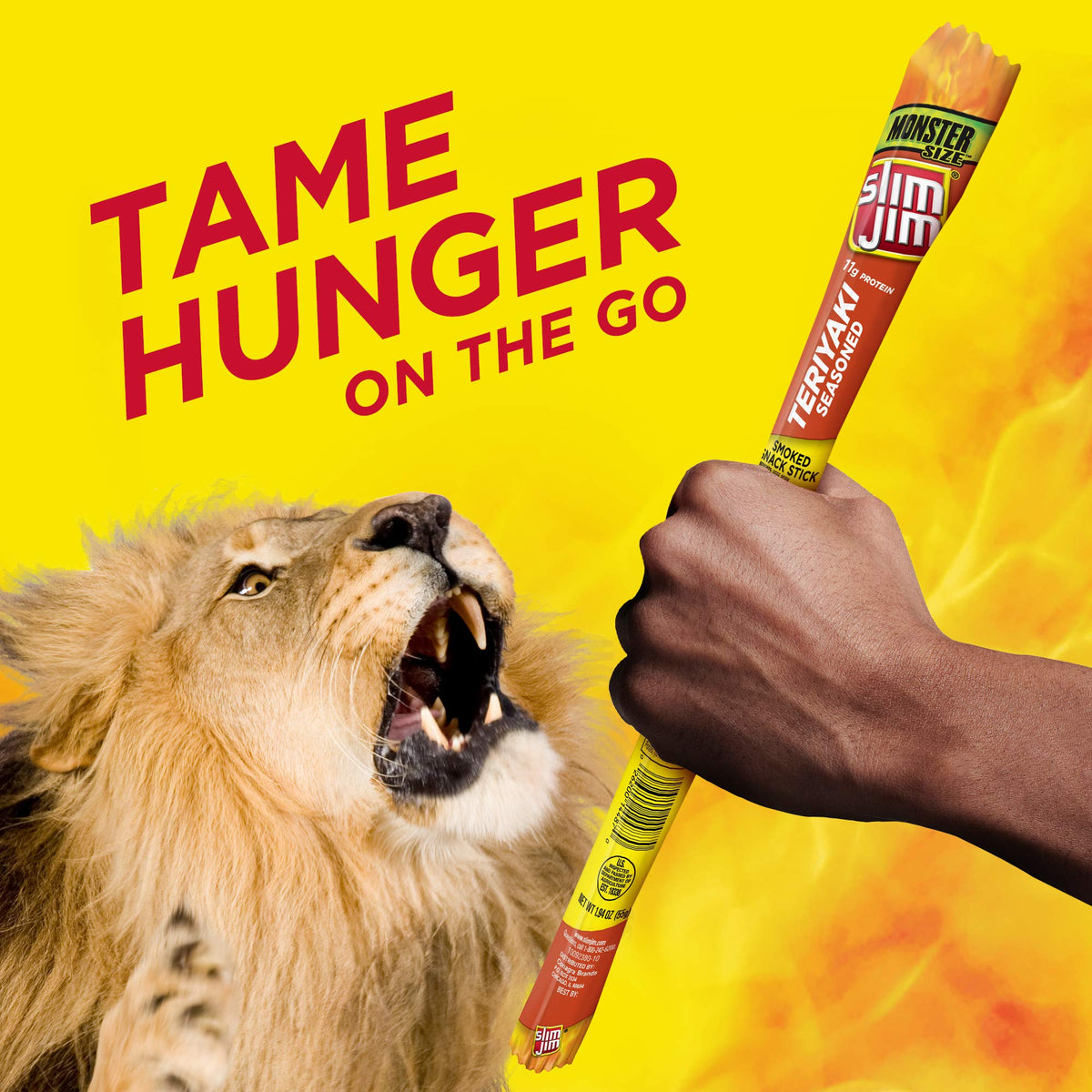 Slim Jim Monster Teriyaki stick held in hand for quick bite