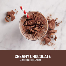 SlimFast shake being poured into a glass with chocolate smoothie