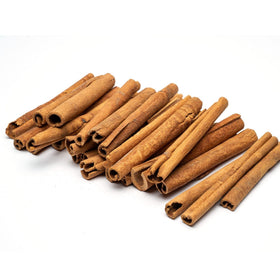 Slofoodgroup Saigon cinnamon sticks closeup highlighting aromatic oils and rich texture