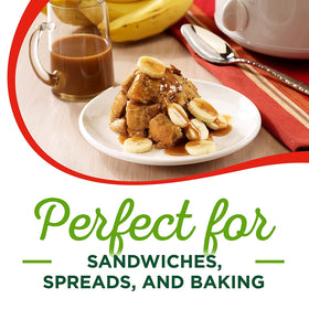 Jar close-up revealing ingredients list on Smart Balance peanut butter.