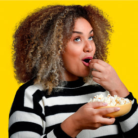 Smartfood 64-pack popcorn box, convenient supply for offices and events.
