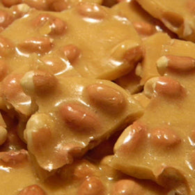 Piece of brittle on a plate invites a quick nostalgic bite
