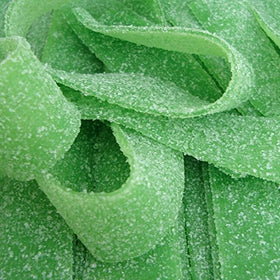 Smarty Stop Every Sour Belts Green Apple closeup, vivid sugar crystals on tangy bite