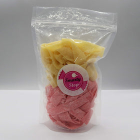 Smarty Stop Sour Every Flavor Mixed Gummy Belts pink lemonade close-up, refreshing party treat.