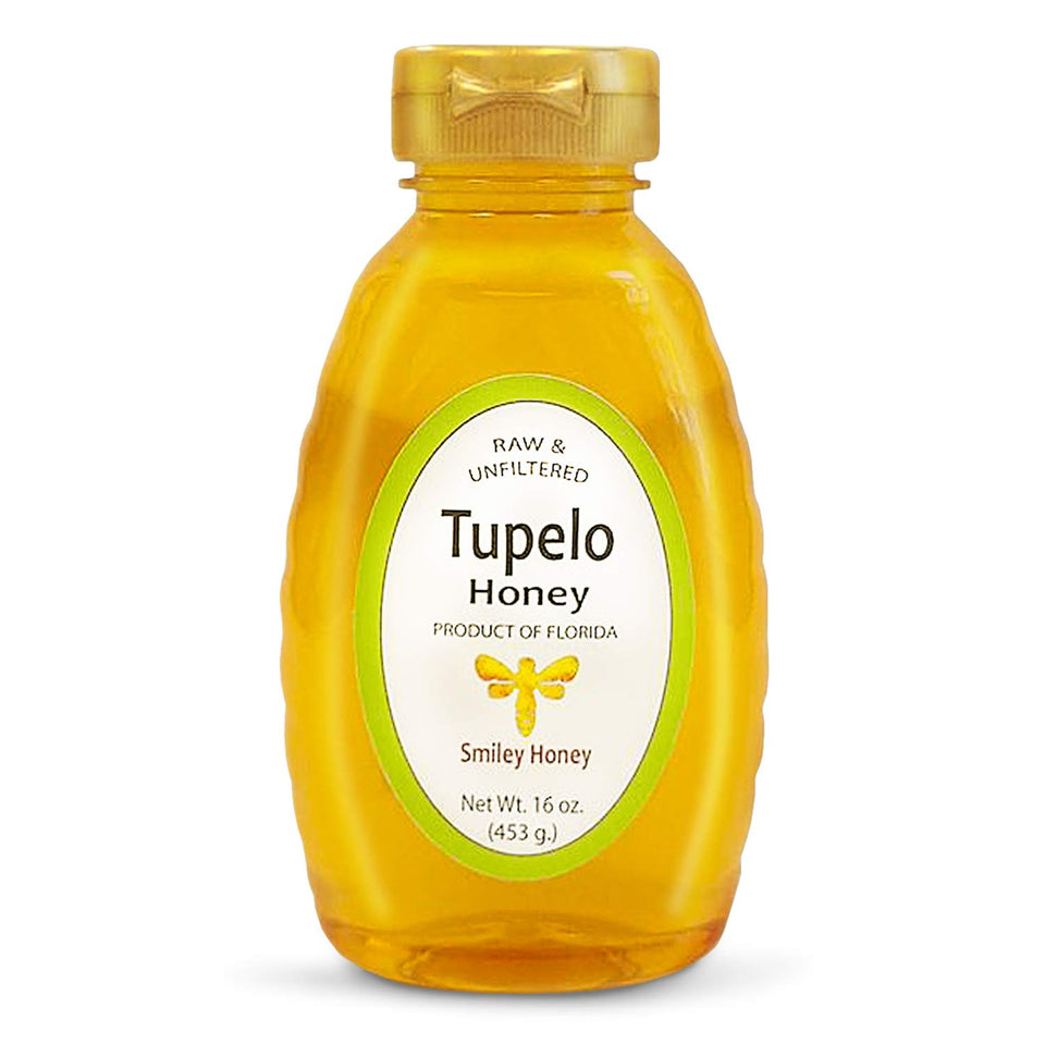 Smiley Honey Tupelo honey bottle, ideal for drizzle and tea pairing.