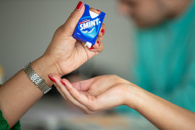 Smint sugar-free mints illustrating guilt-free snacking.