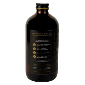 Smokeshow syrup with glass and ice highlighting premium ingredients for cocktails.