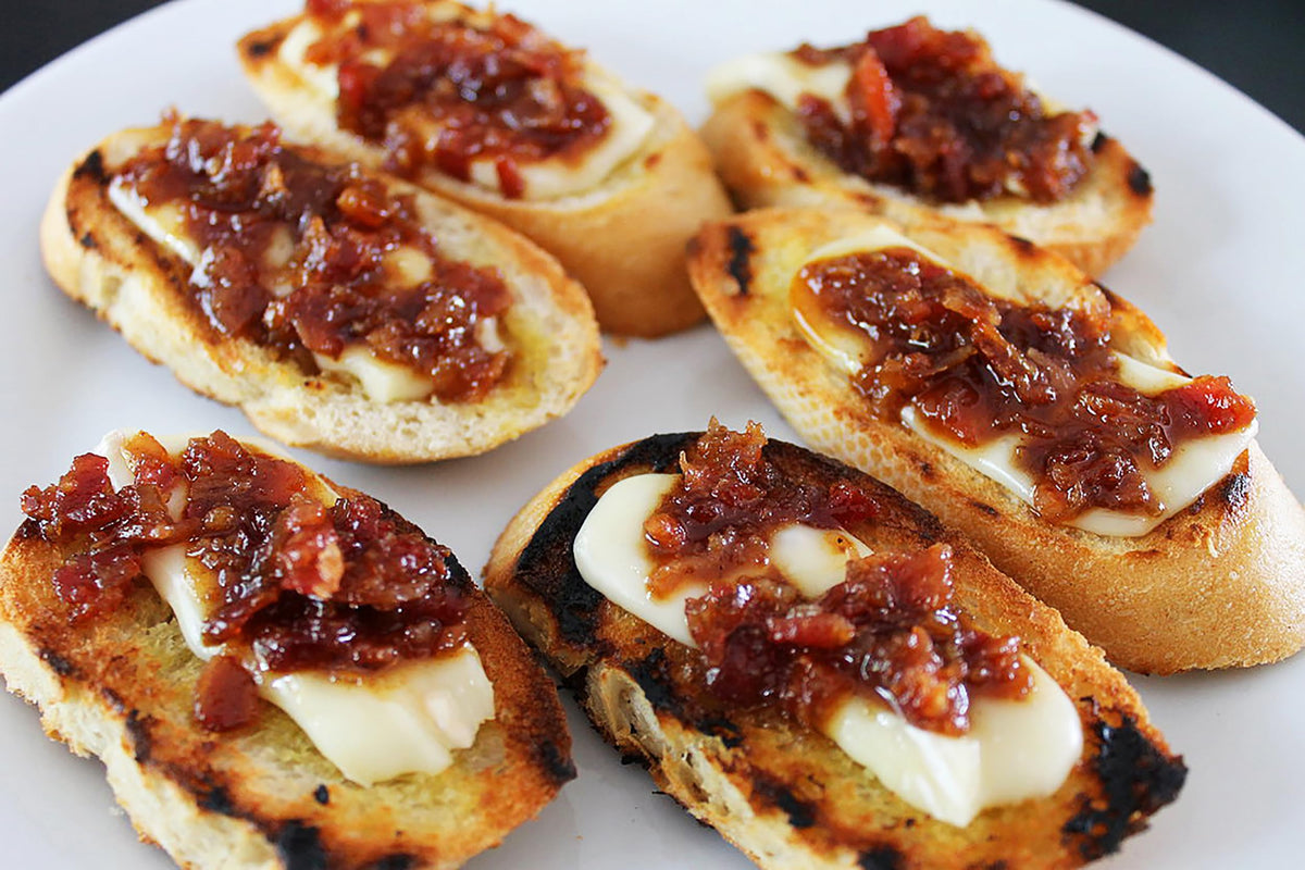Smoky Mountain Southern Style Bacon Jam bottle label highlights its versatile uses.