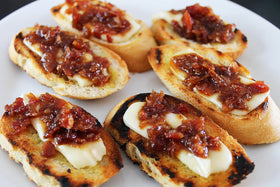 Smoky Mountain Southern Style Bacon Jam bottle label highlights its versatile uses.