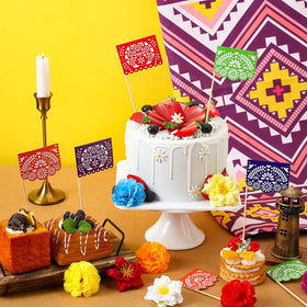 SmoothNovelty mini paper-cut banner brightens cakes and cupcakes at celebrations.