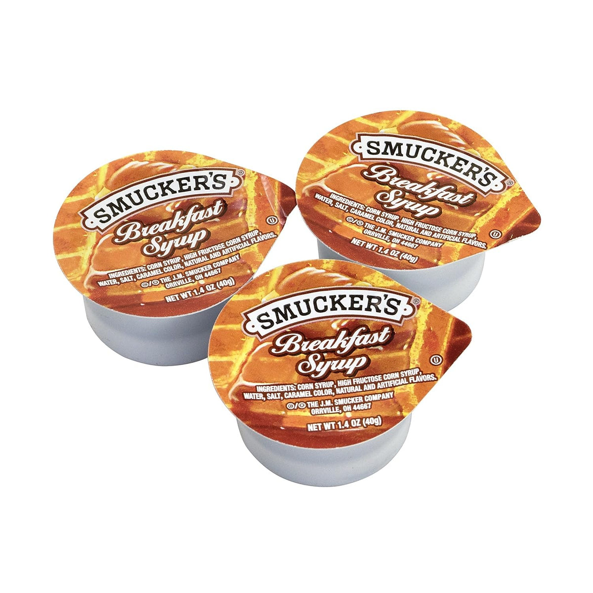 Smucker's breakfast syrup mini tub on table for convenient self-serve at breakfast.