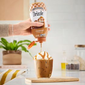 Smucker’s Drizzle caramel syrup on pancakes and waffles for extra flavor