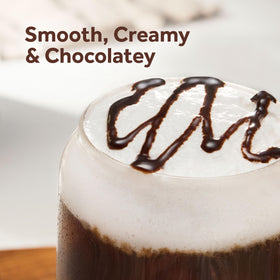 Smucker’s Drizzle in a cup of coffee for rich chocolate flavor