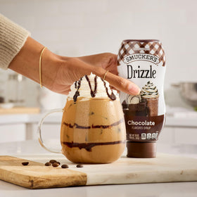 Pancakes drizzled with Smucker’s chocolate syrup for a sweet start