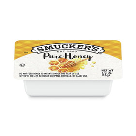 Smucker's Pure Honey portion cup packaging highlights branded quality for guests.