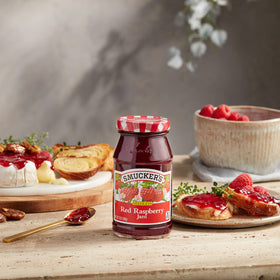 Smucker's raspberry jam on toast demonstrates a versatile breakfast spread.