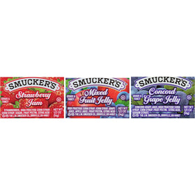 Smucker's strawberry jam half-ounce cup packaging showing portion control and brand.
