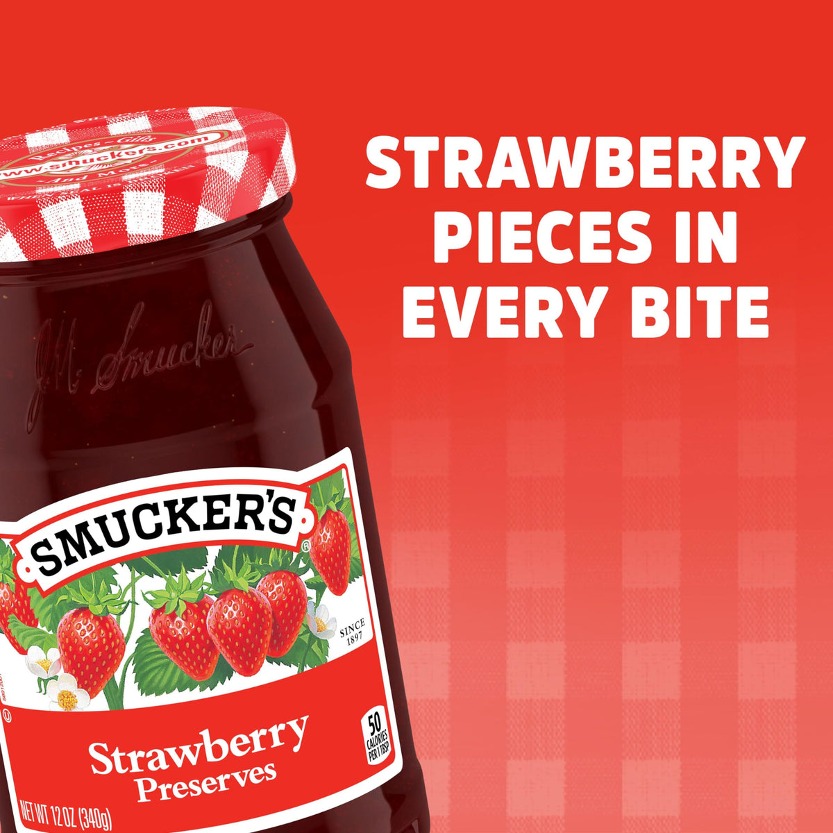 Close-up of strawberry chunks in Smucker's preserves, perfect for glaze or topping.
