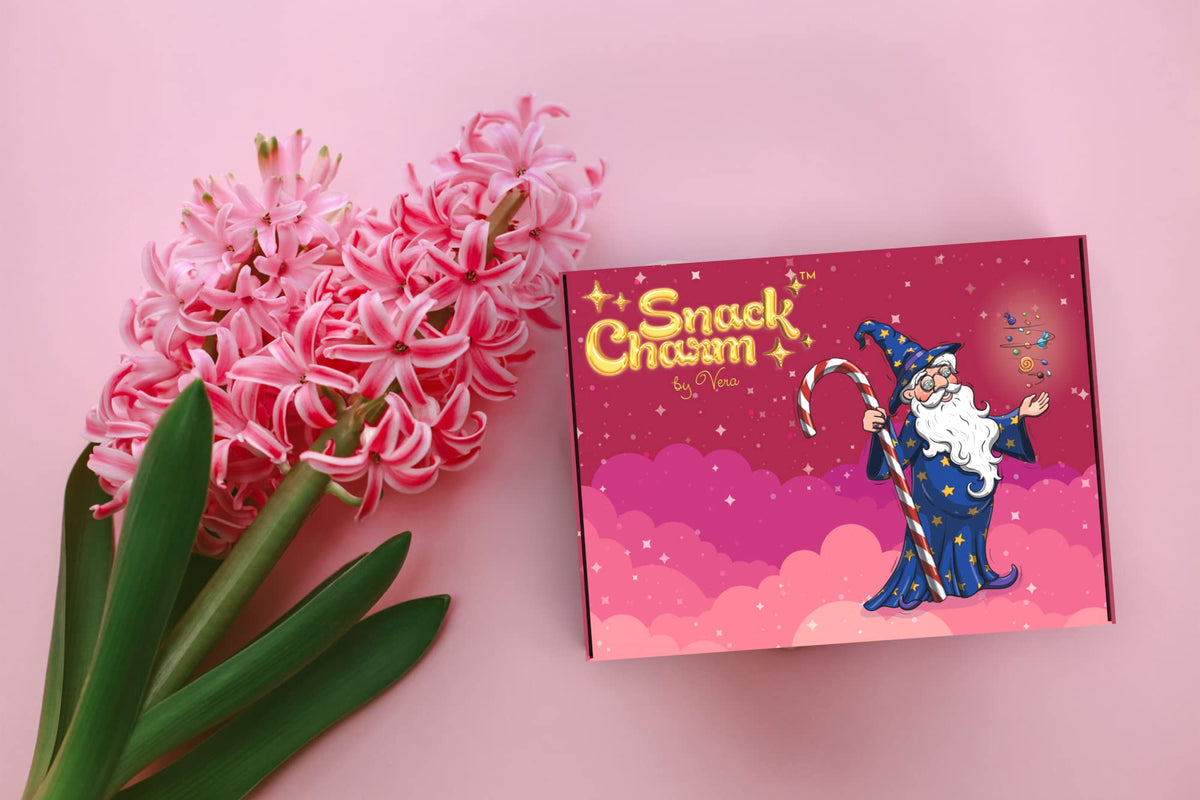 Snack Charm by Vera mystery treat inside box, introducing a playful surprise.