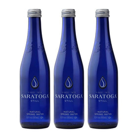 Snack Mass Saratoga Still Water in a glass bottle, premium hydration on the go.
