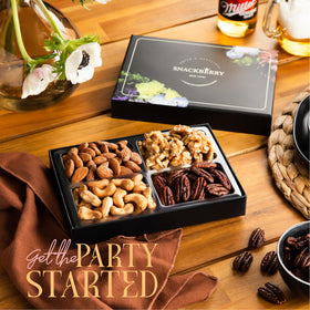 Snackberry gift box on table evokes festive, premium gifting for holidays or birthdays.