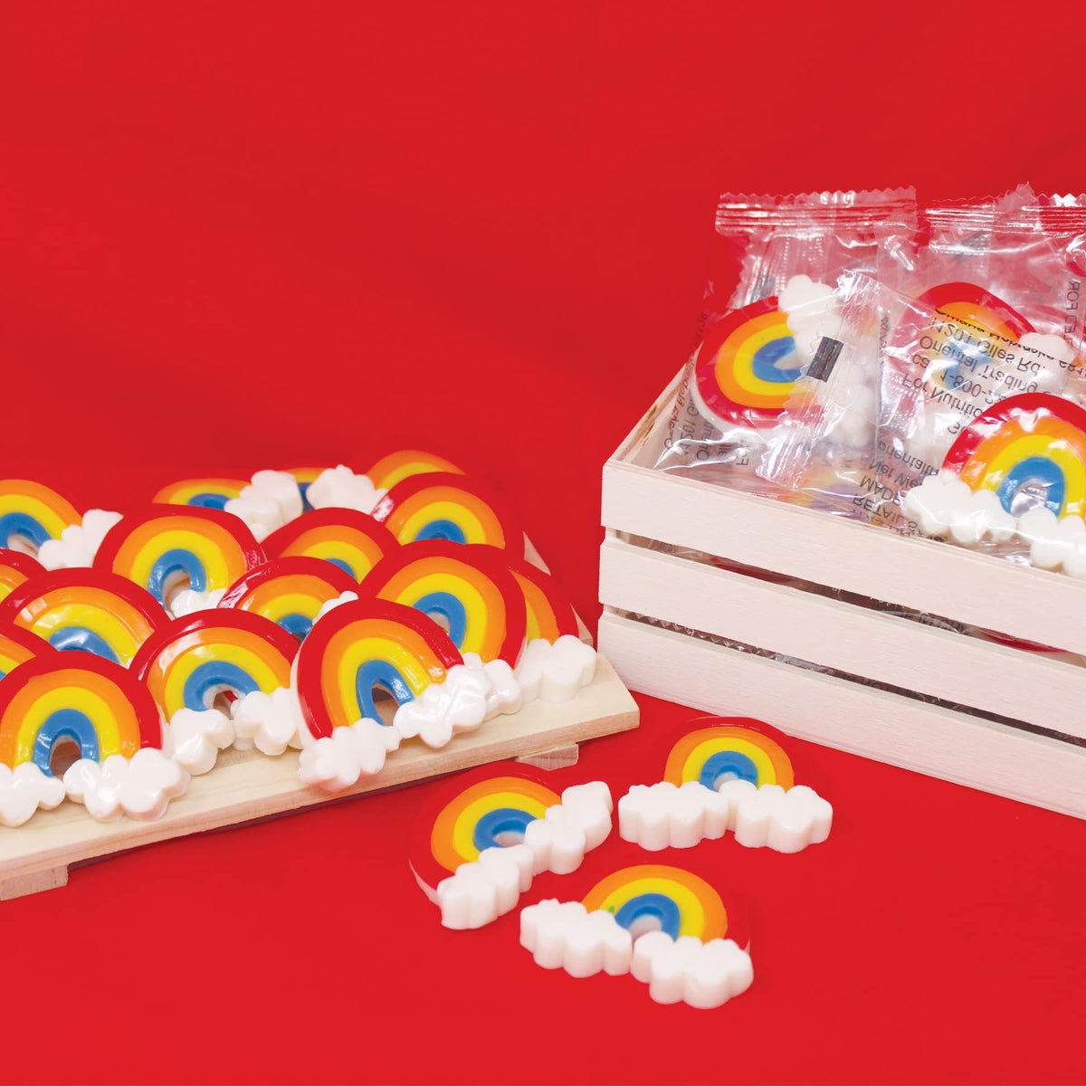 Unicorn baby shower sweets: SNACKTERY Rainbow Gummies brighten dessert tables.