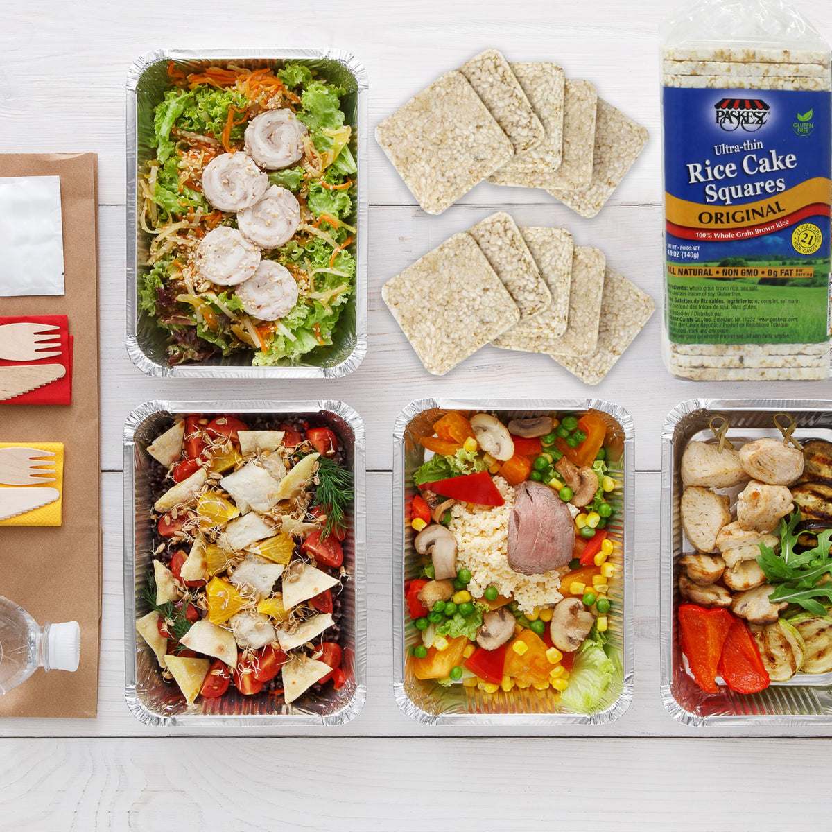 SNACKTERY Ultra Thin Rice Cakes salted on slate, perfect base for spreads.