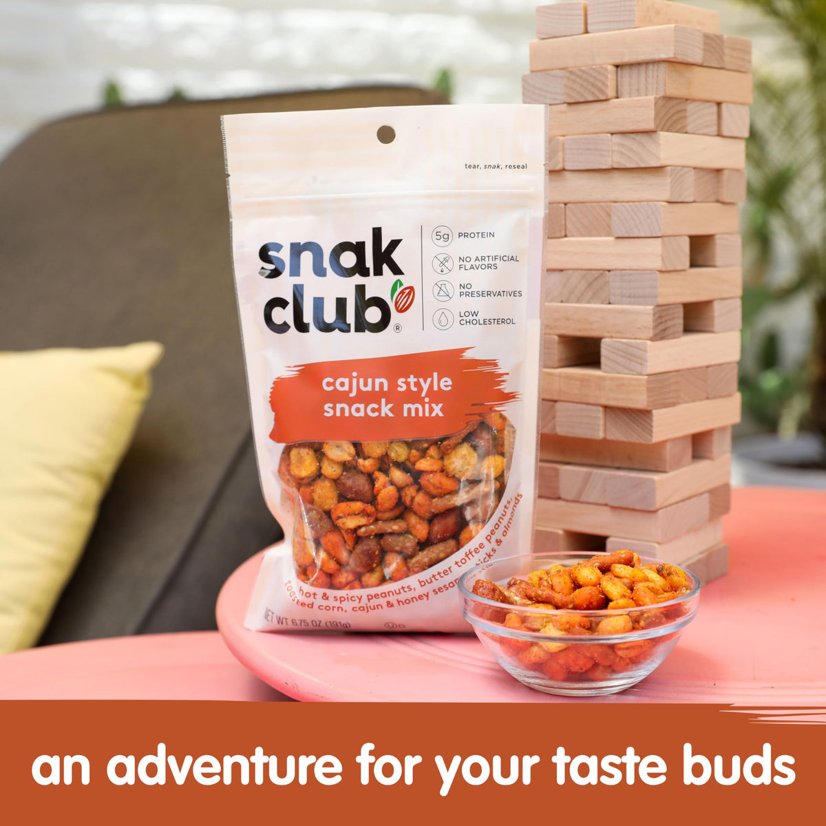 Snak Club Cajun Honey Sesame Sticks close-up, savory sticks for party snacking.