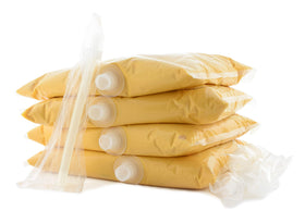 SNAPPY Ricos Nacho Cheese Sauce bags ready for quick-service nachos.