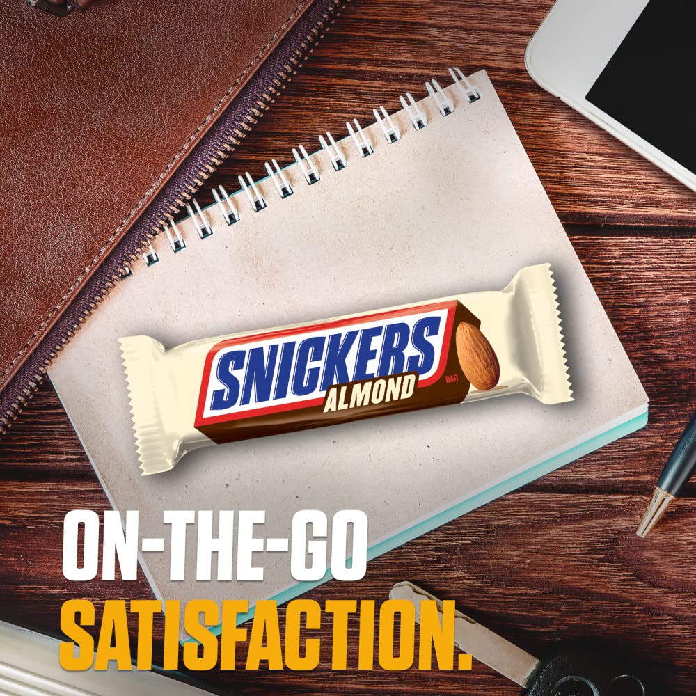 Office breakroom snack: Snickers Almond Bars on desk