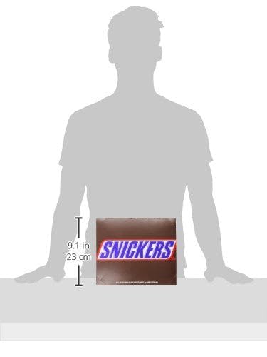 Snickers bar cross-section reveals the peanut-nougat-caramel layers.