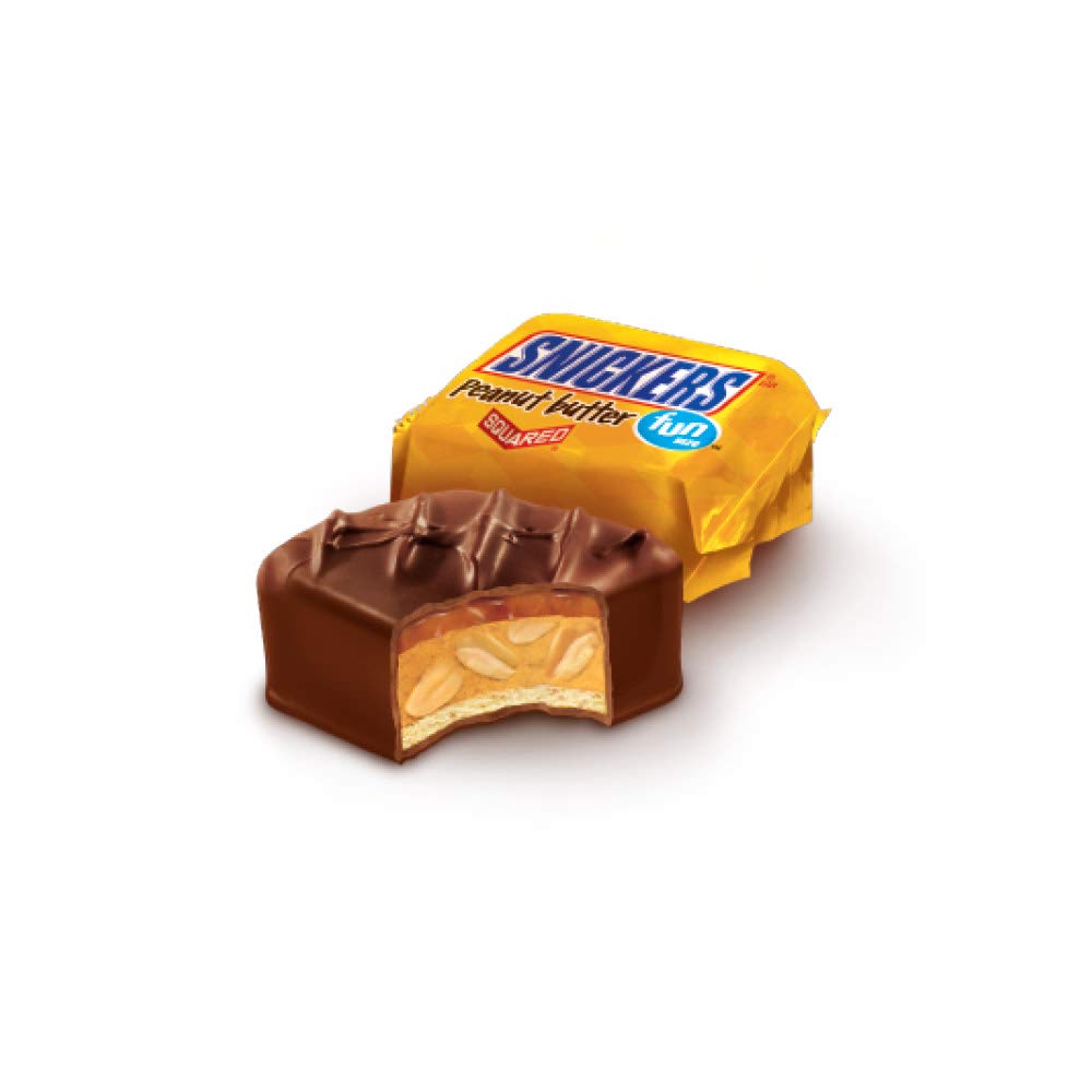 Snickers chocolate peanut butter squares with caramel close-up, ideal for party buffets and gifting.