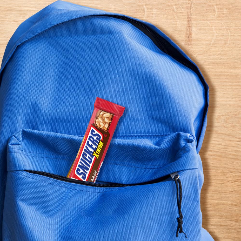 Cross-section reveals peanuts and caramel inside Snickers Xtreme