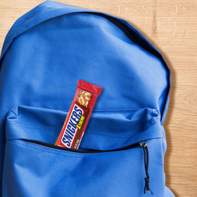 Cross-section reveals peanuts and caramel inside Snickers Xtreme
