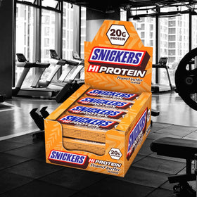 Snickers HI-Protein bar close-up showing chocolate coating and 19g protein.